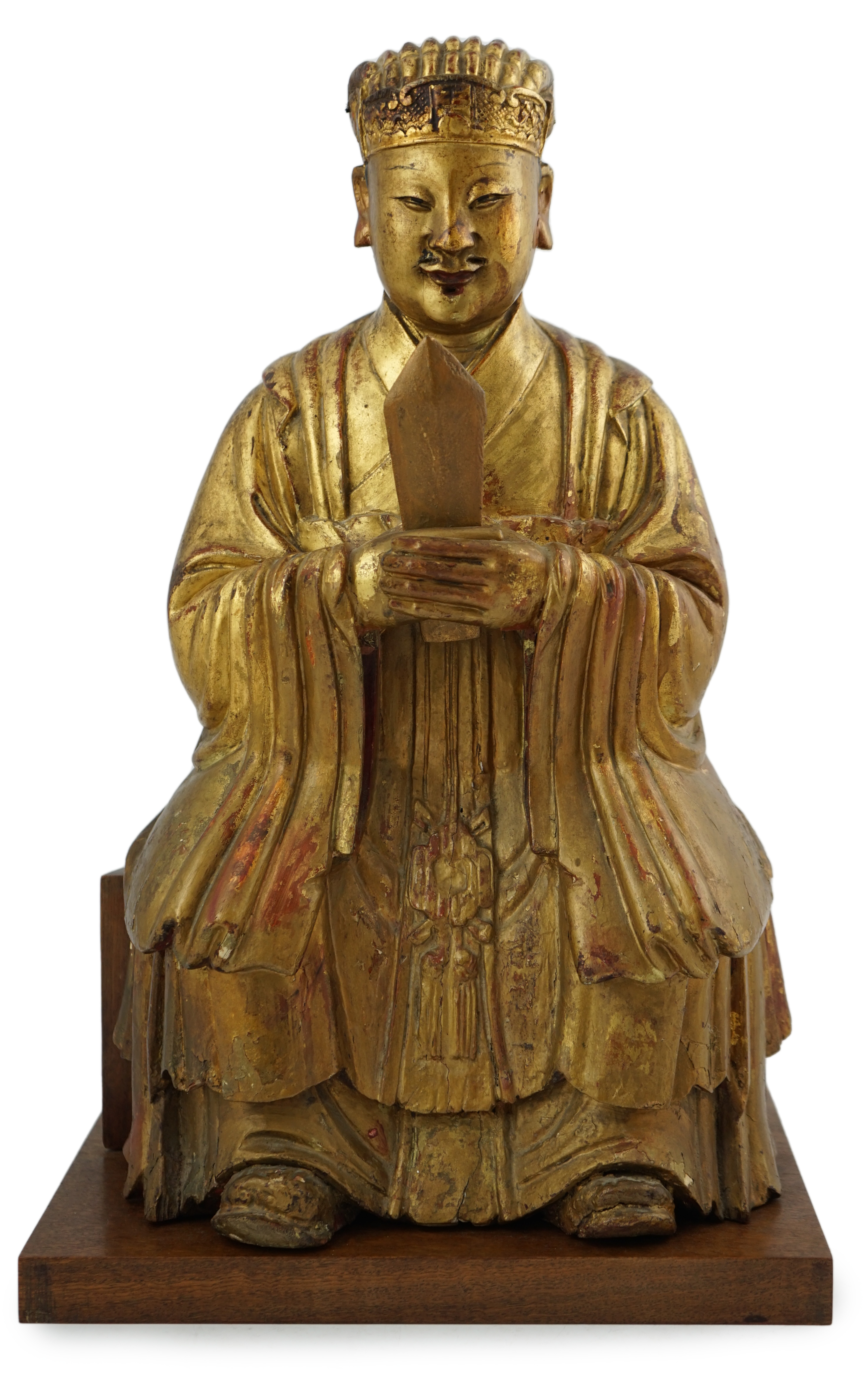 A Chinese gilt lacquered wood seated figure of Wenchang Wang, late Ming, 17th century